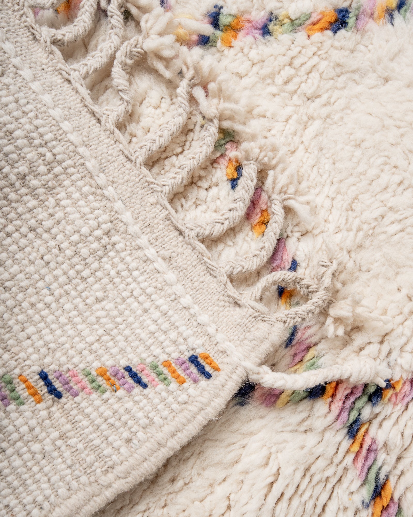 Modern, designer, handcrafted Berber rug from Morocco. Beniourain carpet with beautiful colours and patterns and fluffy wool texture.